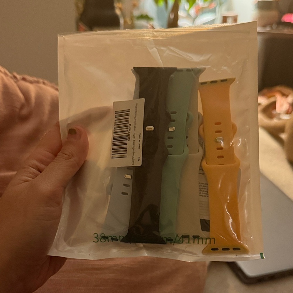 Apple Watch Bands in Black, Yellow, Green, and Blue